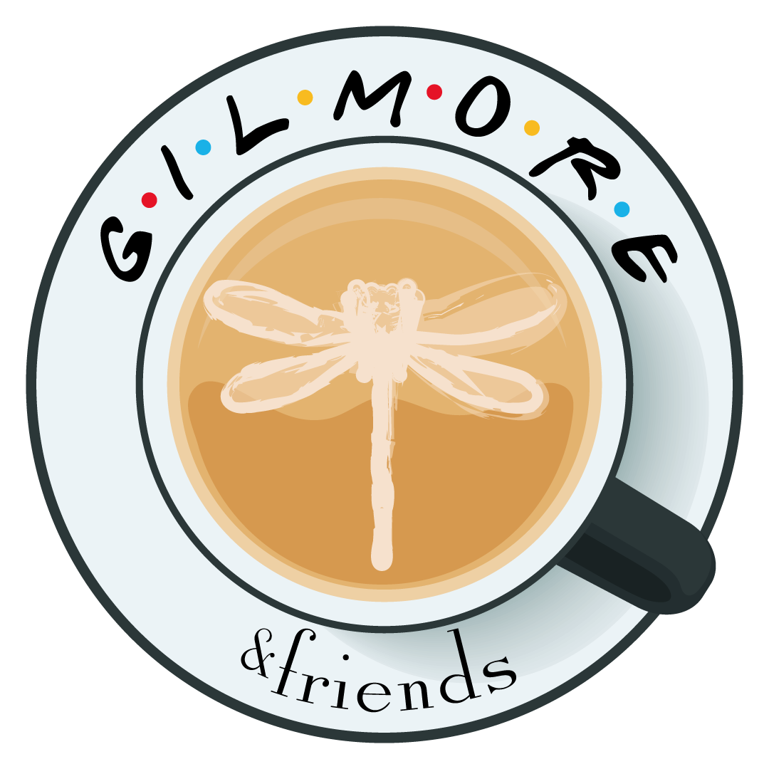 Gilmore and Friends: taza de café con una libélula dibujada en la espuma